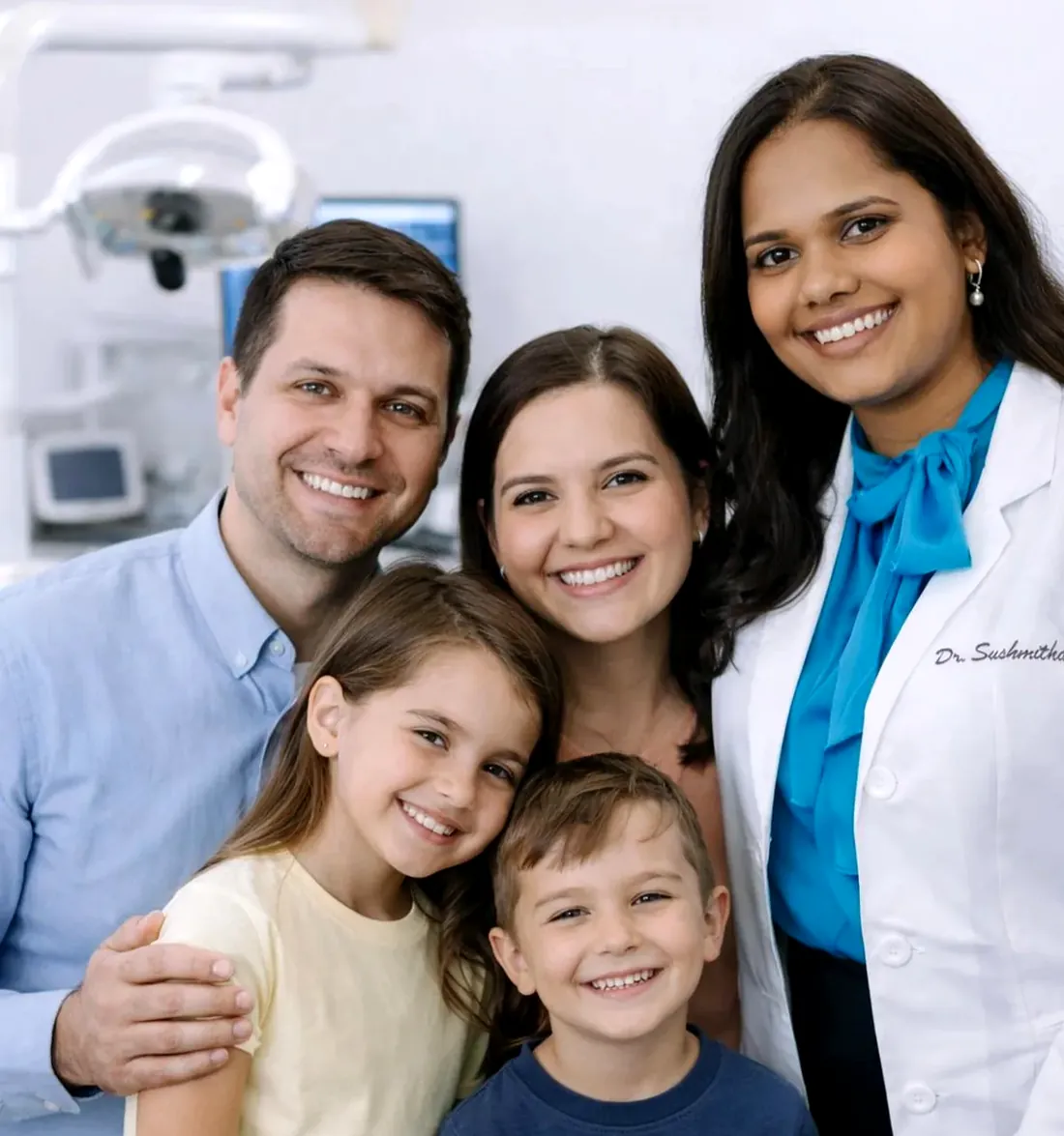 Happy family with dentist at Gentle Smiles of Cherry Hill dental office