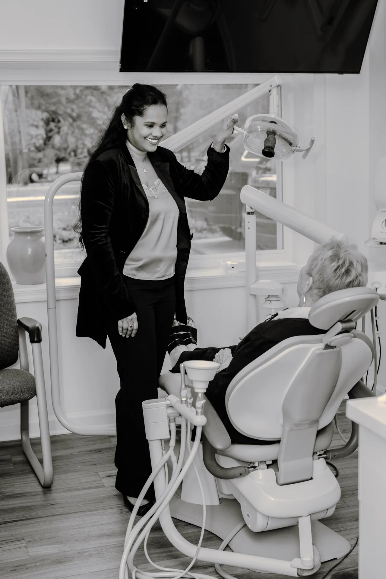 Dr. Jeeri consulting with a patient at Gentle Smiles of Cherry Hill, NJ